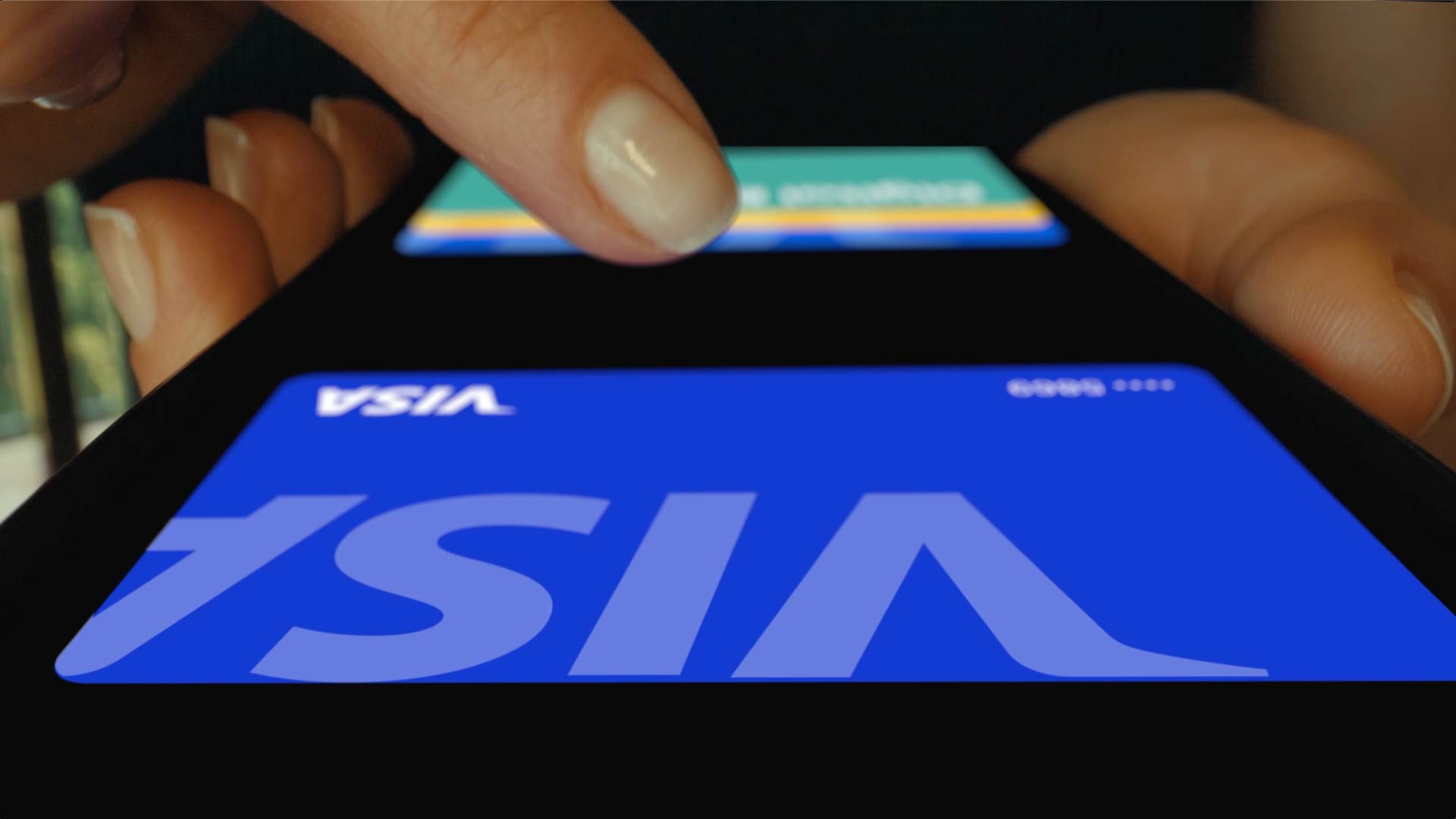 Digital wallet with a blue visa card at the top.