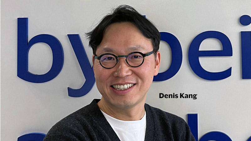 Portrait of Denis Kang, a Visa employee in AP who takes advantage of Visa matches.