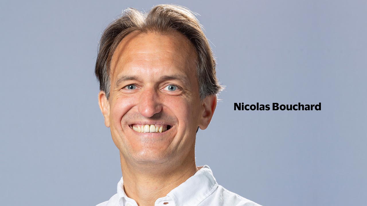 Portrait of Nicholas Bouchard, a Visa employee in EUR who takes advantage of Visa matches.