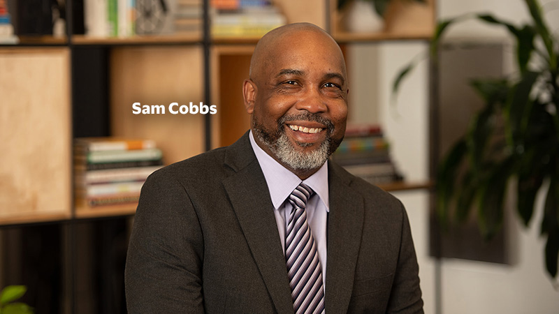 Portrait of Sam Cobbs, CEO of Tipping Point who positively impacted Bay Area youth homelessness.
