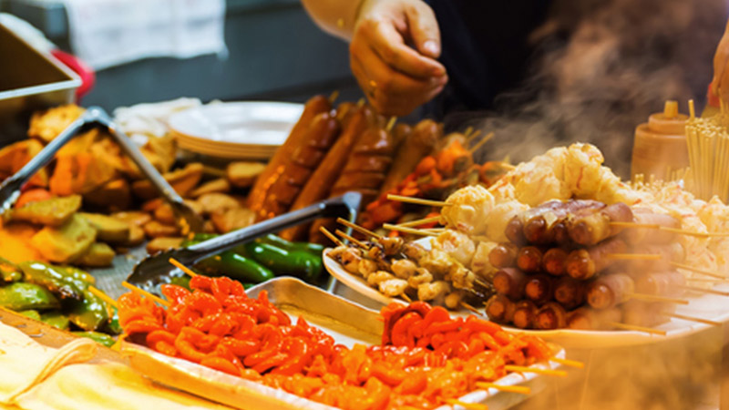 Meats on skewers on a grill Meats on skewers on a grill