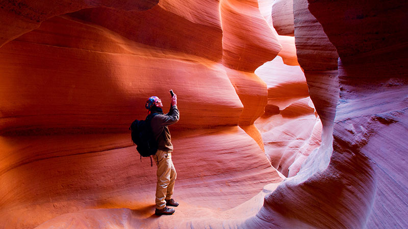 Hiker in Antelope Canyon Hiker in Antelope Canyon