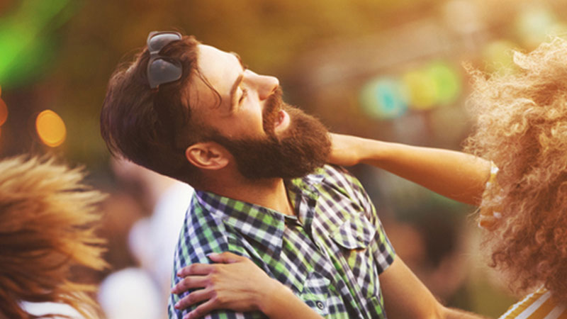 Bearded man dancing with woman Bearded man dancing with woman