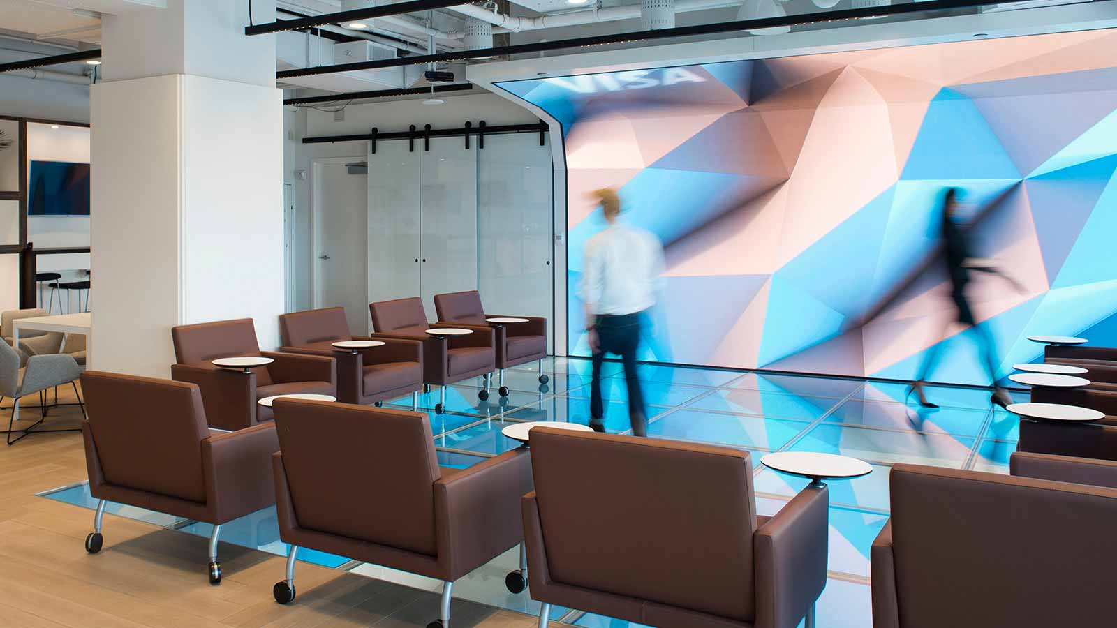 A stylish shot features a meeting area in the Visa Design studio.