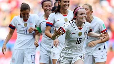 The USA women’s soccer team celebrates a big moment.