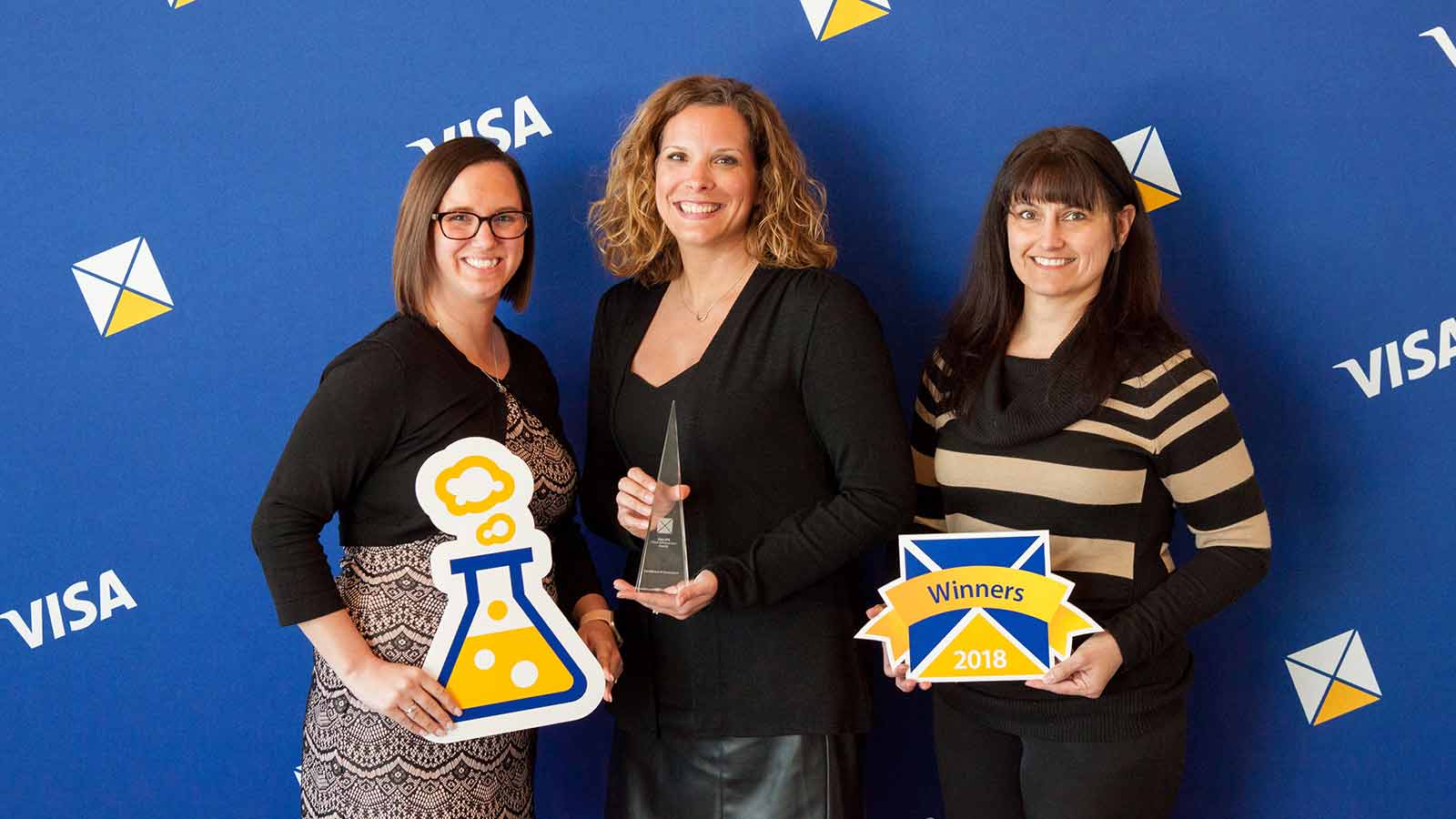 Three female award winners. 
