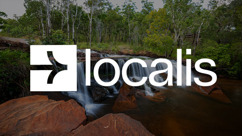 Localis logo superimposed on an image of a waterfall.