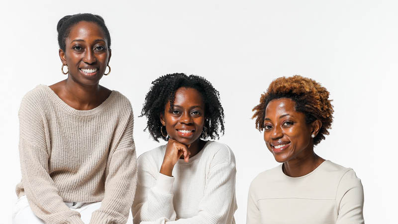 A headshot of Dr. Naana Boakye and sisters, owners of Karité.