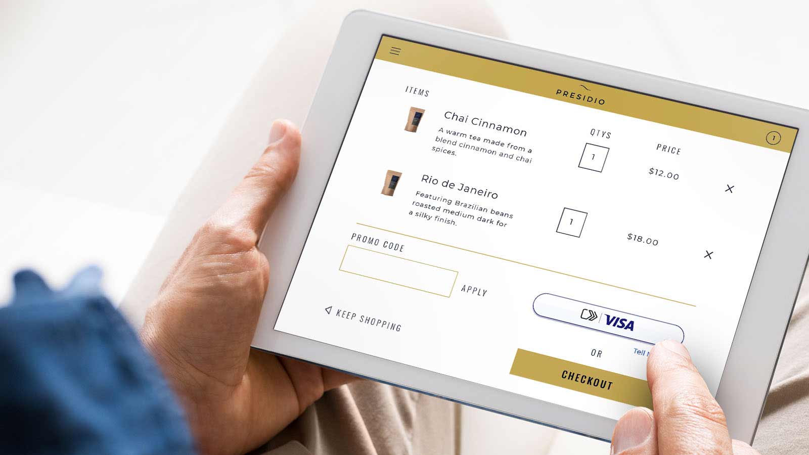 Closeup of a tablet displaying the new Visa checkout experience.