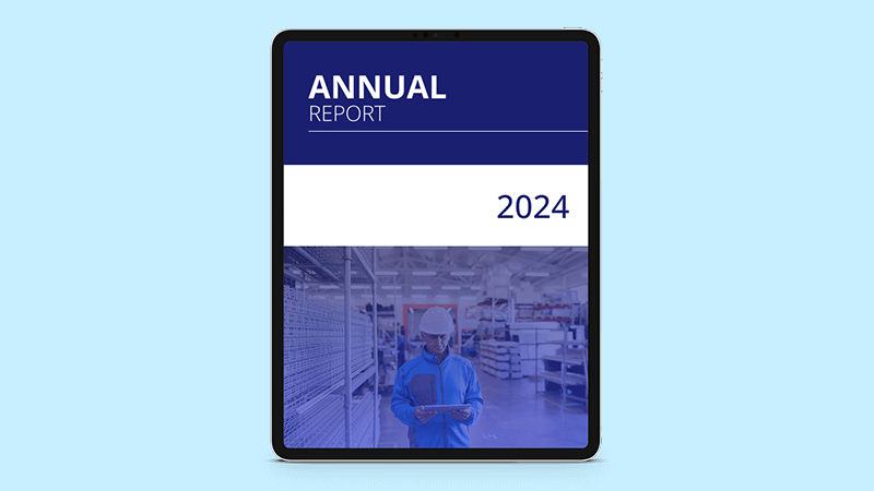 Tablet with a 2024 annual report on screen.