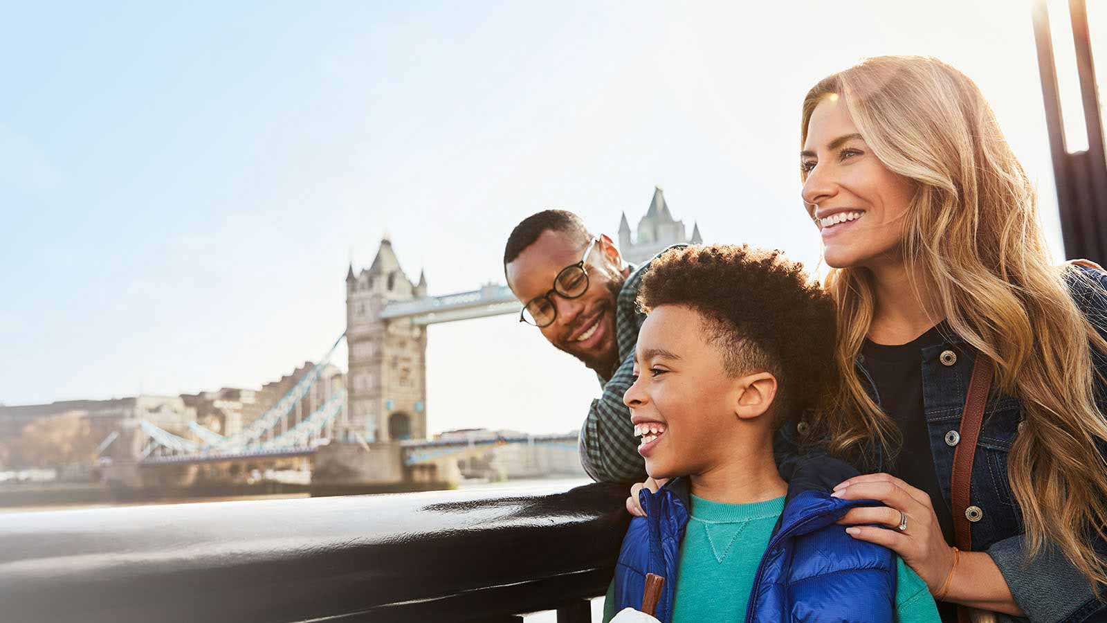 A family enjoying London sightseeing along the river Thames.